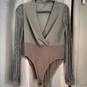 Elegant Gray Wrap Bodysuit with Sheer Polka Dot Sleeves